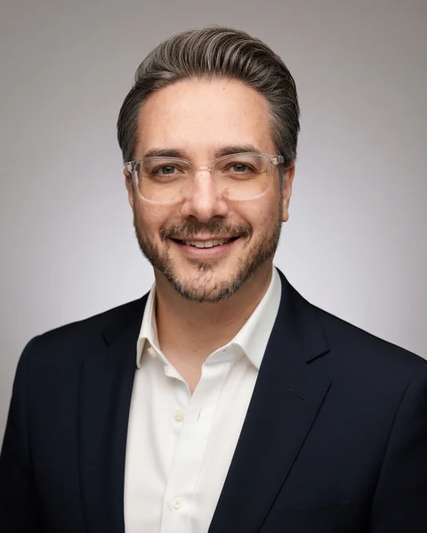 Portrait of Charlie wearing a dark jacket